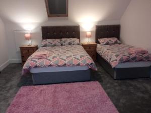 Postel nebo postele na pokoji v ubytování Greenway Guesthouse