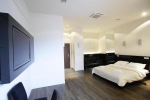 Łóżko lub łóżka w pokoju w obiekcie Villa & Spa