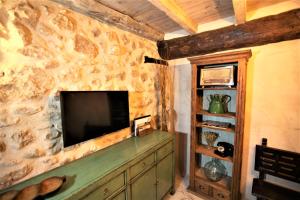 A television and/or entertainment centre at Wabisabi Townhouse