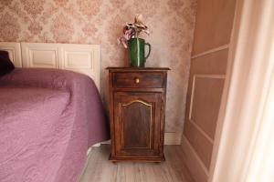 A bed or beds in a room at Wabisabi Townhouse