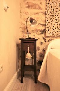 A bed or beds in a room at Wabisabi Townhouse