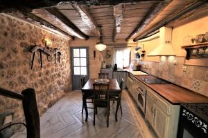 A kitchen or kitchenette at Wabisabi Townhouse