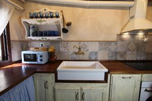 A kitchen or kitchenette at Wabisabi Townhouse