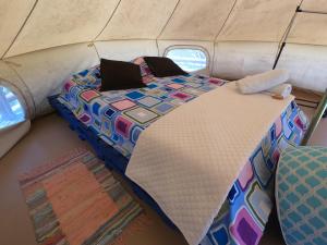 Postel nebo postele na pokoji v ubytování Glamping Due Amici