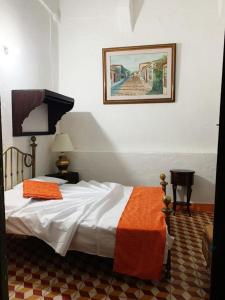 Postel nebo postele na pokoji v ubytování Casa Museo Alcantus