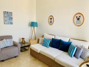 a living room with a couch and a chair at VISTA MARE in Crotone