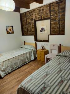 Posteľ alebo postele v izbe v ubytovaní La casita de la señora María
