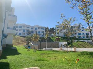 Κήπος έξω από το Résidence Neuve avec Piscine - M’diq