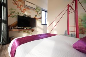 Letto o letti in una camera di Mr.Lee