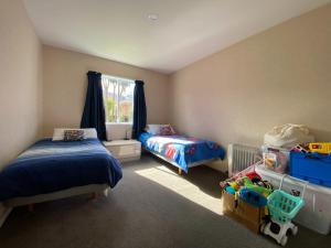 Un pat sau paturi într-o cameră la 23b Harrogate Street