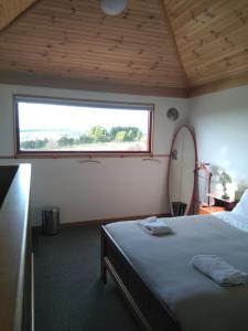 Cherry Top Farmstay - Boutique Eco Village客房内的一张或多张床位