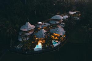 an aerial view of a resort with a building at Eco Six Bali in Tampaksiring +100 photos
