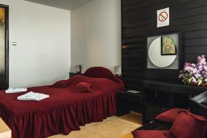 Cama ou camas em um quarto em Hotel Lepenski Vir