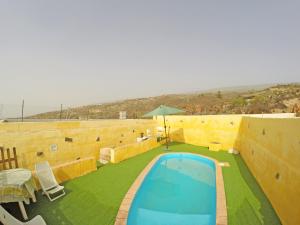 Bazén v ubytování Finca Noya con piscina privada nebo v jeho okolí