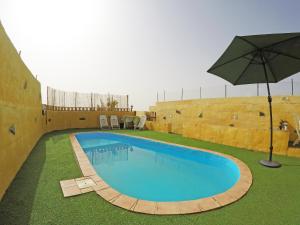 Bazén v ubytování Finca Noya con piscina privada nebo v jeho okolí