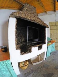 TV a/nebo společenská místnost v ubytování Finca Noya con piscina privada