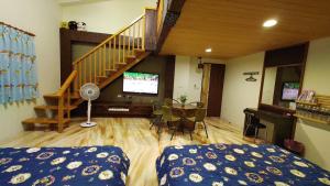 Letto o letti in una camera di 鄉間雅築休閒民宿Country Villa Homestay