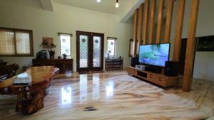 TV o dispositivi per l'intrattenimento presso 鄉間雅築休閒民宿Country Villa Homestay