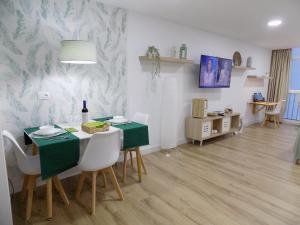 TV a/nebo společenská místnost v ubytování Salitre Suite