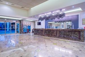 The lobby or reception area at Euphoria Palm Beach Resort