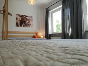 Posteľ alebo postele v izbe v ubytovaní Willa Stary Dom