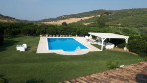 an overhead view of a swimming pool in a yard at Agriturismo Trappeto Vecchio in San Demetrio Corone