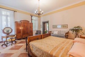 Postel nebo postele na pokoji v ubytování B&B Dal Viceré - Villa Mezzalira