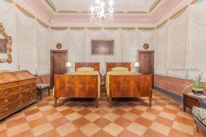 Postel nebo postele na pokoji v ubytování B&B Dal Viceré - Villa Mezzalira