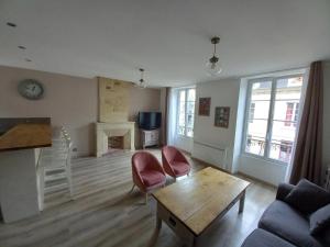 Un televizor și/sau centru de divertisment la Appartement centre-ville Bayeux, tout à pied !
