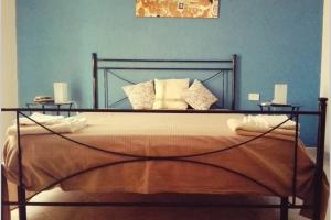 Posteľ alebo postele v izbe v ubytovaní Casa vacanza in villa con piscina!