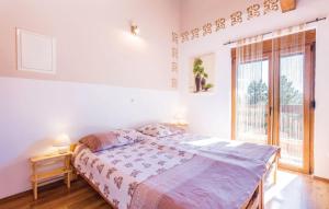 Ein Bett oder Betten in einem Zimmer der Unterkunft Guest house Donna