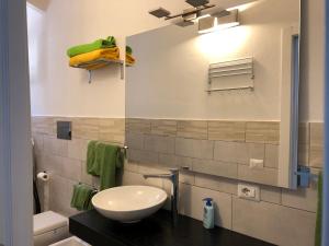 A bathroom at La dolce vita , fronte mare