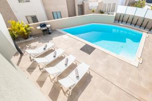 Bazén v ubytovaní Villa Alisios Golf Luxury Tenerifesummervillas Heated pool alebo v jeho blízkosti