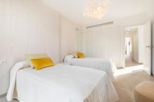 Posteľ alebo postele v izbe v ubytovaní Villa Alisios Golf Luxury Tenerifesummervillas Heated pool