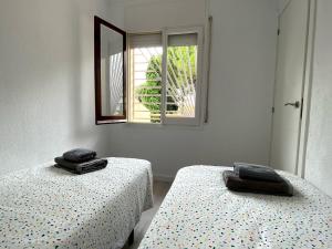 Posteľ alebo postele v izbe v ubytovaní Apartamentos Stil Mar Anna - Stil ideal Anna + 24 fotografií