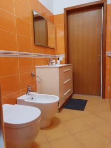 Ett badrum på Appartamento Ionios