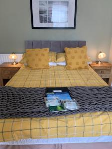 A bed or beds in a room at Wentworth Guest House 