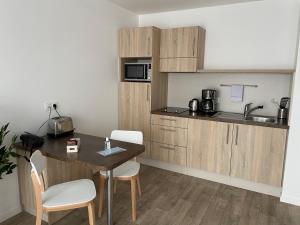 Foto dalla galleria di DOMITYS LES NOTES FLORALES a Combs-la-Ville Altre 19 foto