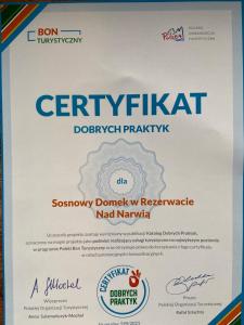 Certyfikat, podpis lub inny dokument wystawiony w obiekcie Sosnowy domek w rezerwacie nad Narwią