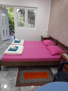 Postel nebo postele na pokoji v ubytování Apartmani Evelin 1