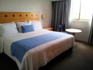 Кровать или кровати в номере Hotel Stella Maris