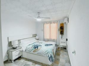 Ένα ή περισσότερα κρεβάτια σε δωμάτιο στο Casa Palacios de Marchena