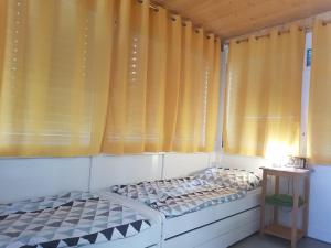 Postel nebo postele na pokoji v ubytování Kleblach 90, 9753 Lind im Drautal