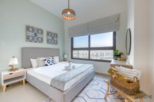 Fotografie z fotogalerie ubytování Community Living 2BR Close to Emirates Golf Club, Golf Views A, Madinat Al Mataar by Deluxe Holiday Homes v Dubaji