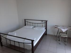 Postel nebo postele na pokoji v ubytování Valentina Rooms