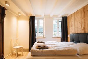 Tempat tidur dalam kamar di Holiday House BURGBLICK2 with garden - VOSPROPERTIES