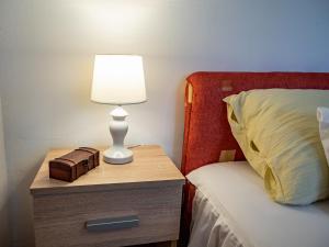 מיטה או מיטות בחדר ב-Holiday Home Navis