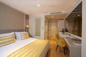 Postel nebo postele na pokoji v ubytování Icon Hotel Taksim + 37 fotografií