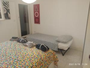 A bed or beds in a room at Casa Gardel