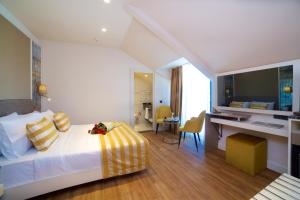 A television and/or entertainment centre at Icon Hotel Taksim